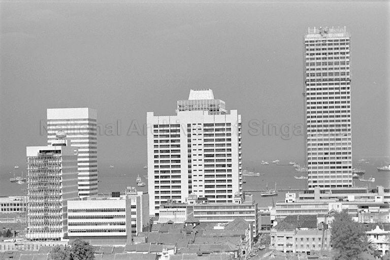 Robina House (left) and the soon-to-be-ready ICB Building (corner of Boon Tat Street and Shenton Way, in front of Robina House in picture), Shing Kwan House (right of ICB Building), and DBS Building with twin towers (right) dwarf over the shop houses along Cecil Street and Telok Ayer Street.