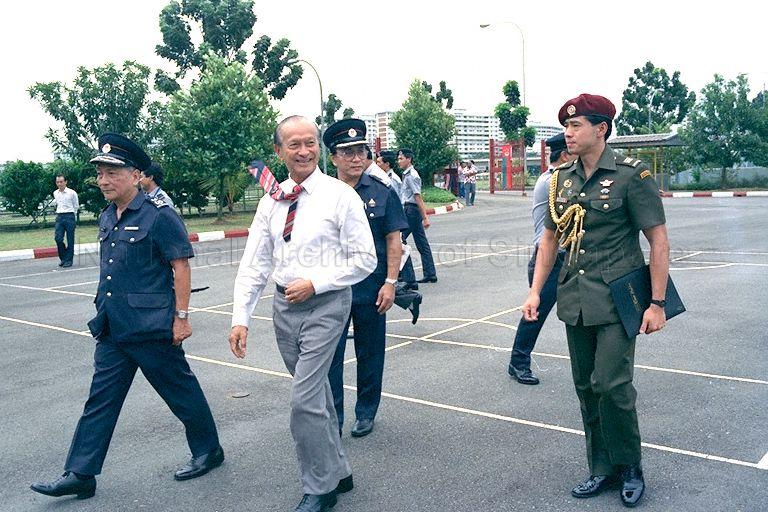President Wee Kim Wee arriving at Ang Mo Kio Fire Station in Ang Mo Kio Avenue 9. At his right is Director of Singapore Fire Service Arthur Lim Beng Lock while Deputy Director (Operations and Training) Tan Jin Thong is behind him.