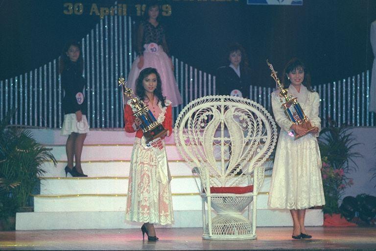 Miss Jessica Foo (right), 22, and Miss Jacqueline Foo (left), 23, both clerks, are named first and second runners-up respectively of the first Miss Union 1989 pageant organised by National Trades Union Congress (NTUC) at Neptune Theatre Restaurant. They also win the titles of Miss Crowning Glory and Miss Photogenic respectively. Behind Miss Jacqueline Foo is Miss Cerlyn Neo, 23, who is named Miss Body Beautiful and Miss Elegance.
