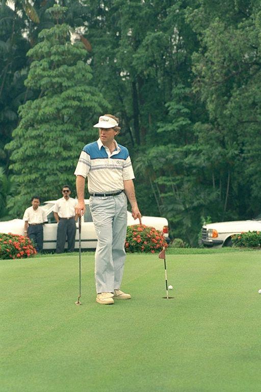 Vice-President of United States of America (US) Dan Quayle playing a six-hole golf game at the Istana grounds