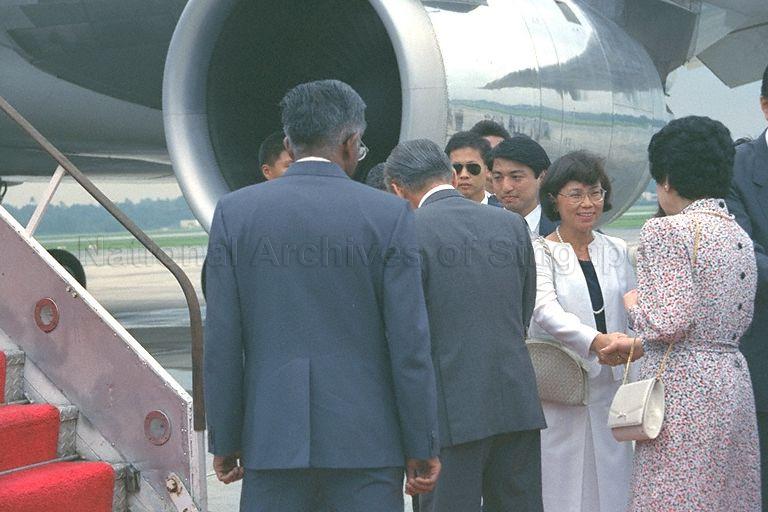 Minister of National Development S Dhanabalan (hidden) and his wife Christine (white outfit) sending off Japanese Prime Minister Noboru Takeshita and his wife at Changi Airport