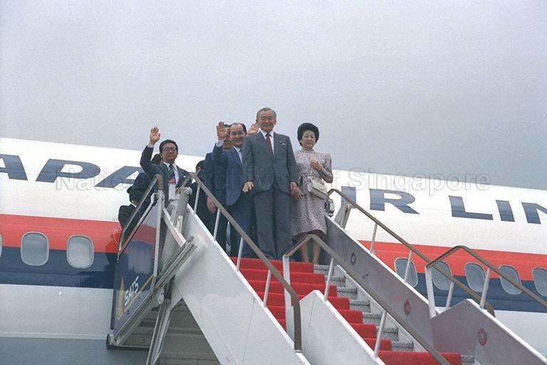 Japanese Prime Minister Noboru Takeshita, Mrs Takeshita and his delegation waving goodbye from the entrance of the plane at Changi Airport after a two-day visit to Singapore. Mr Takeshita leaves for Jakarta where he will deliver a keynote speech. He will then proceed to Manila before returning to Tokyo. The premier has visited Thailand and Malaysia.