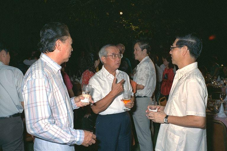(From left) Retired Member of Parliament (MP) Dr Yeoh Ghim Seng, Minister for Finance Dr Richard Hu, and Second Deputy Prime Minister Ong Teng Cheong, chatting during the valedictory dinner in the garden between Parliament House and its Annexe for 14 former PAP MPs who stepped down in September 1988. Dr Yeoh has been the Speaker of Parliament for nearly 19 of the 23 years that Singapore has been independent. He was elected in 1966. Dr Yeoh is now a surgeon in private practice. Behind Dr Hu are Speaker of Parliament Tan Soo Khoon, and retired MP for Tanglin and former Minister for Law E W Barker (partly hidden).