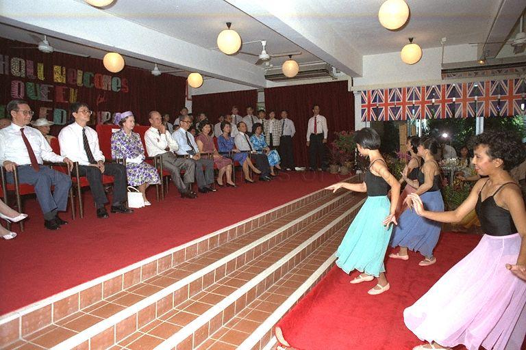 National University of Singapore (NUS) hostelites performing a skit for Her Majesty Queen Elizabeth II and Prince Philip, Duke of Edinburgh at the Raffles Hall during the royal couple's visit to the campus at Kent Ridge Crescent