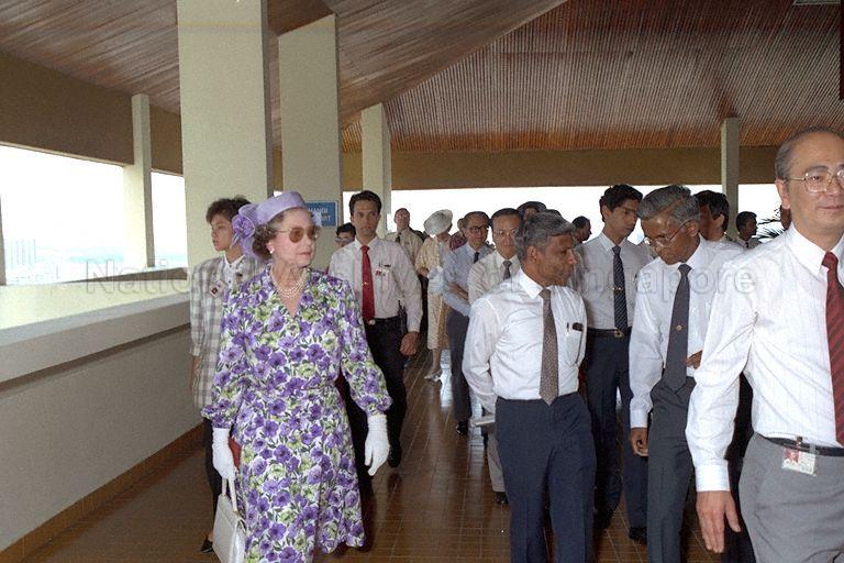 Her Majesty Queen Elizabeth II, accompanied by Minister for National Development S Dhanabalan visiting the viewing gallery at VIP Block 710, Ang Mo Kio Town Centre