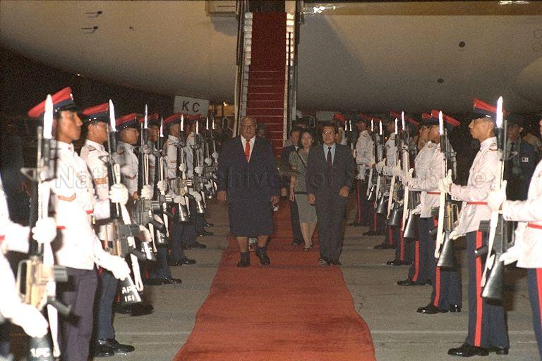 Prime Minister of Western Samoa Tofilau Eti Alesana (front, left) and Mrs Pitolua Alesana (hidden behind Mr Alesana) arriving at Singapore Changi Airport. With them are Deputy Speaker of Parliament Abdullah Tarmugi (right) and Mrs Tarmugi (behind Mr Tarmugi). Mr Alesana is stopping over on his way to the October 18-24 Commonwealth Heads of Government Meeting (CHOGM) in Kuala Lumpur.