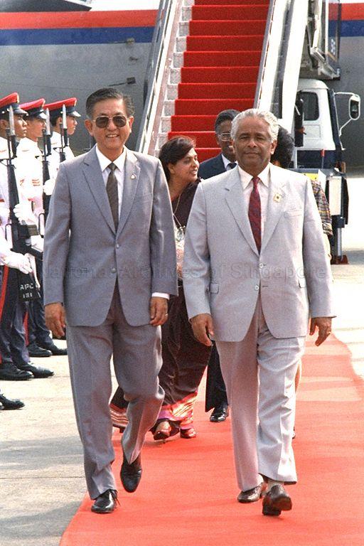 Prime Minister of Mauritius Sir Anerood Jugnauth (right) and Mrs Sarojini Jugnauth (centre) being met by Minister of State for Ministry of Community Development Ch'ng Jit Koon (left) and Mrs Ch'ng (hidden behind Mr Jugnauth) at Singapore Changi Airport. Mr Jugnauth is stopping over here for a brief visit on his way home from the October 18-24 Commonwealth Heads of Government Meeting (CHOGM) in Kuala Lumpur.