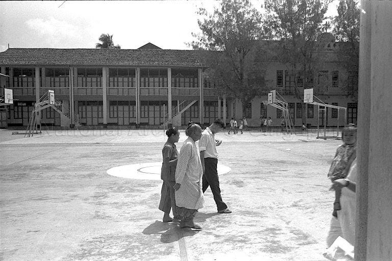 Voters arriving at polling station to cast their votes on polling day during Legislative Assembly General Elections