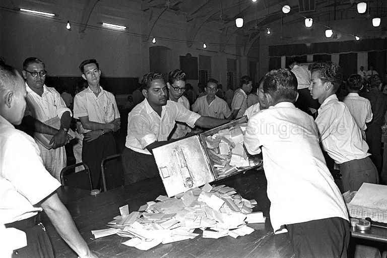 Counting of votes gathered from various polling stations at a centralised counting centre. The ruling People's Action Party was re-elected to a second term after it won 37 out of the 51 seats in the Legislative Assembly during Legislative Assembly General Elections.