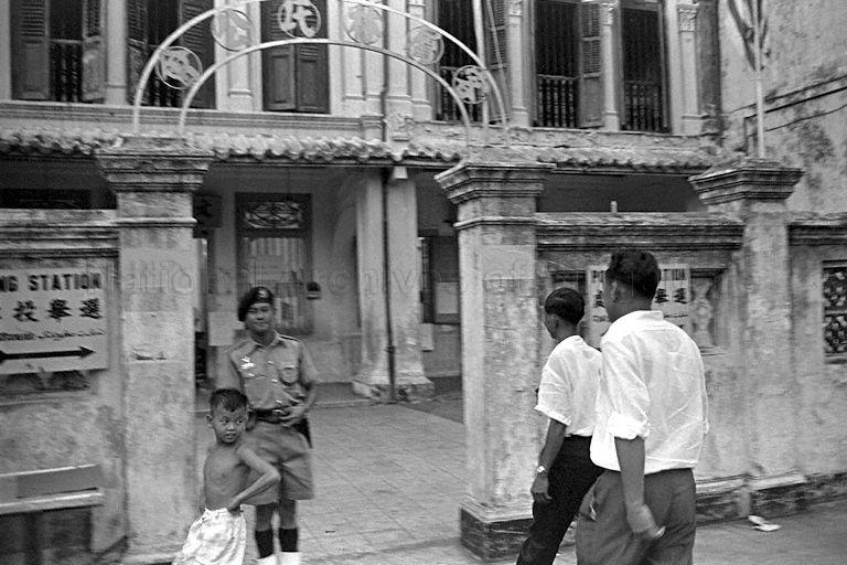 Prime Minister Lee Kuan Yew stepping into Wen Hsuan School at 162 Neil Road. The school was one of the polling stations for the electoral division of Tanjong Pagar.