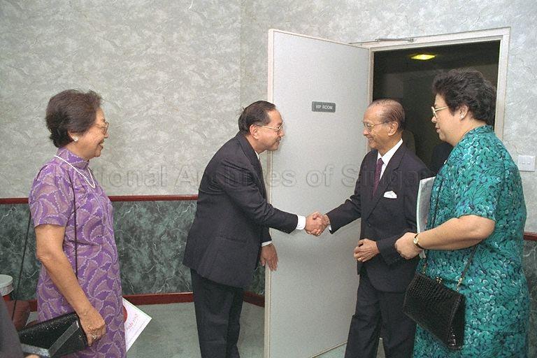 President Wee Kim Wee, joined by Principal of the Singapore Chinese Girls' School (SCGS) Rosalind Heng (extreme right), going through a receiving line upon his arrival at the Kallang Theatre for the opening night of Once Upon A Christmas, a dance performance by SCGS to raise funds for its new premises in Dunearn Road