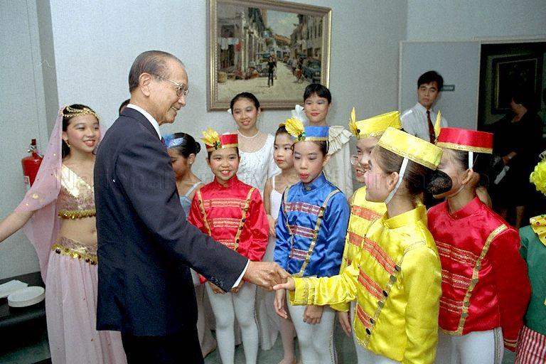 President Wee Kim Wee greeting performers during the opening night of Once Upon A Christmas, a dance performance by Singapore Chinese Girls' School to raise funds for its new premises in Dunearn Road
