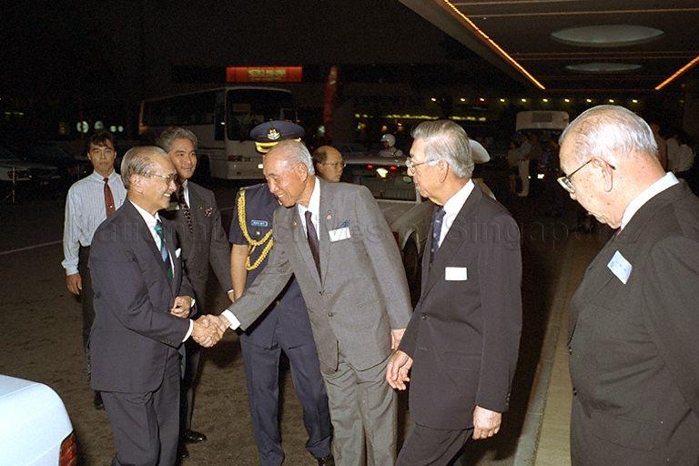 Guest of honour, President Wee Kim Wee going through a