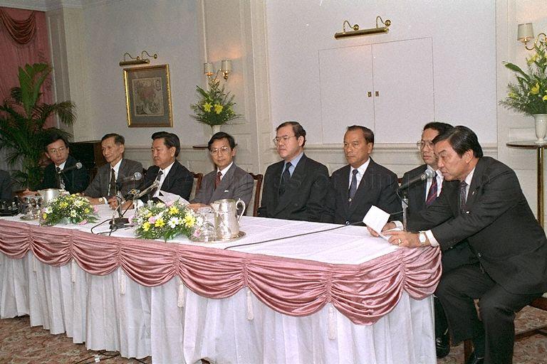 Thai Prime Minister Chuan Leekpai (fourth from left) addressing a press conference during his three-day official visit to Singapore