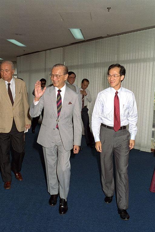 Flanked by Minister for Health and for Community Development