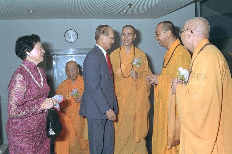 Secretary-general of the Singapore Buddhist Federation, Venerable Shi Ming Yi (third from right) and other officials receiving President Wee Kim Wee and the First Lady upon their arrival for the Vesak Day Grand Celebration, organised by the Singapore Buddhist Vesak Celebration committee at Singapore Indoor Stadium