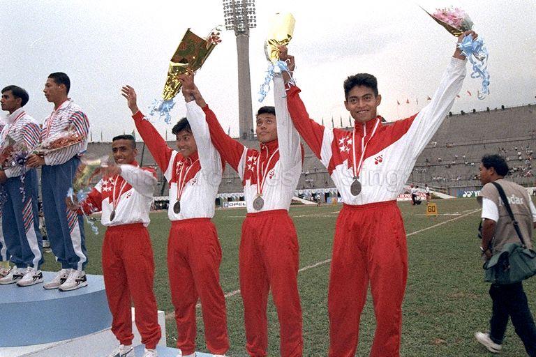 Singapore team with their bronze medals at victory ceremony