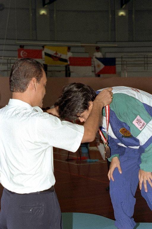 Brunei's Umi Kalthum Abdul Karin winning Women's Silat gold at the 17th South-East Asia (SEA) Games 1993 held at Yio Chu Kang Sports Hall