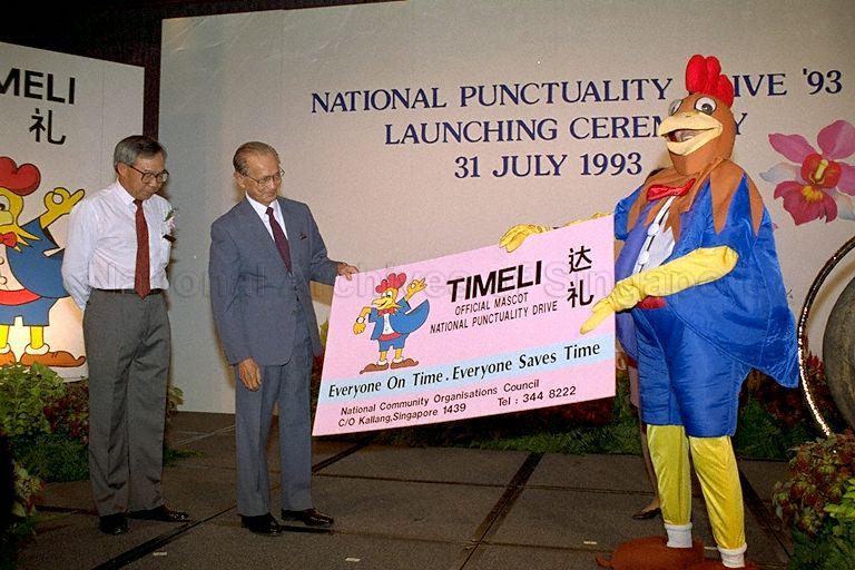 President Wee Kim Wee and Timeli, the rooster mascot for the punctuality campaign during the launch of the National Punctuality Drive 1993, Pan Pacific Hotel