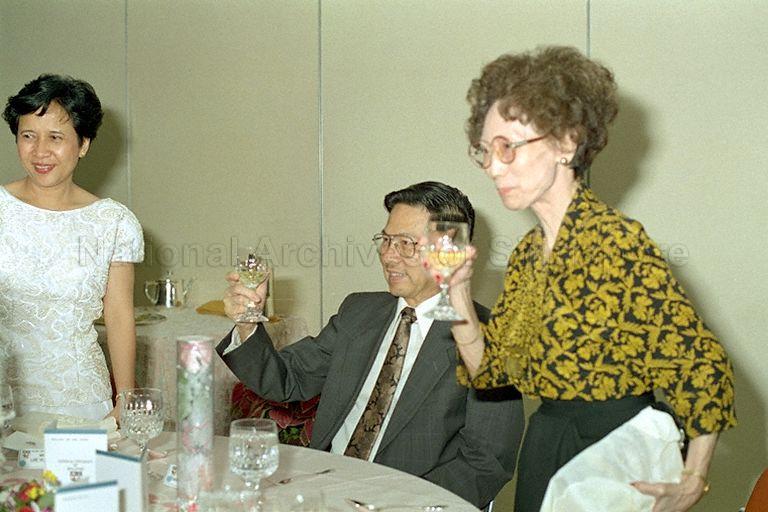 Mrs Adeline Lee, wife of Minister for Education Lee Yock Suan (not in picture) and guests proposing a toast to President Ong Teng Cheong (seated) during the National University of Singapore's convocation dinner held at the Institute of Systems Science, Kent Ridge campus