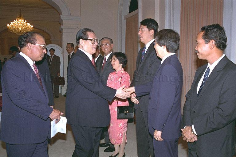 Ambassador-at-Large Professor Tommy Koh, flanked by Minister of State for Finance and Communications Rear-Admiral (RAdm) Teo Chee Hean and Parliamentary Secretary to Ministry of Foreign Affairs, Yatiman Yusof, greeting President of the People's Republic of China, Jiang Zemin prior to the state banquet hosted by President Ong Teng Cheong (not in picture). &nbsp;Leading the receiving line is Prime Minister Goh Chok Tong.