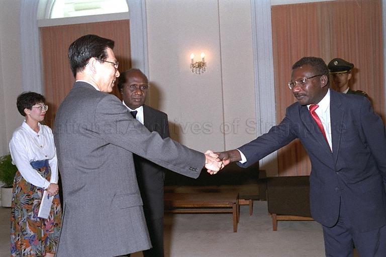 Governor-General of the Solomon Islands Moses Pitakaka (facing camera) introducing a member of his delegation to President Ong Teng Cheong during a courtesy call in the Istana