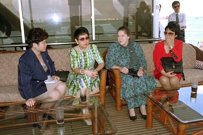 Mrs Dallas Hayden, wife of Australian Governor-General Bill Hayden, and Mrs Abdullah Tarmugi (second from left), wife of Acting Minister for Community Development and Senior Minister of State for Home Affairs, on board 'Harbour Queen' during a harbour cruise