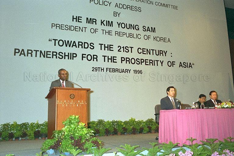Minister for Foreign Affairs and Law Professor S Jayakumar giving opening address at lunchtime policy address co-hosted by Institute of Policy Studies (IPS) and Korea-Singapore Economic Cooperation Committee held at Suntec Singapore Convention and Exhibition Centre. Among those seated on stage is visiting South Korean President Kim Young-sam (right).