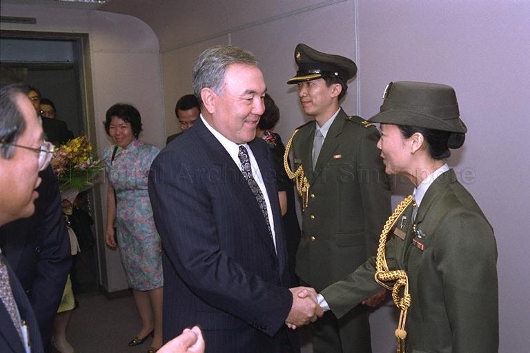 Kazakhstan President Nursultan Nazarbayev being greeted as he arrives at Singapore Changi Airport Terminal 2