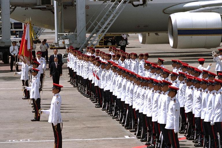 Prime Minister of Thailand Banharn Silpa-archa reviewing the guard of honour during an official welcome ceremony with Prime Minister Goh Chok Tong on the tarmac of Singapore Changi Airport Terminal 2