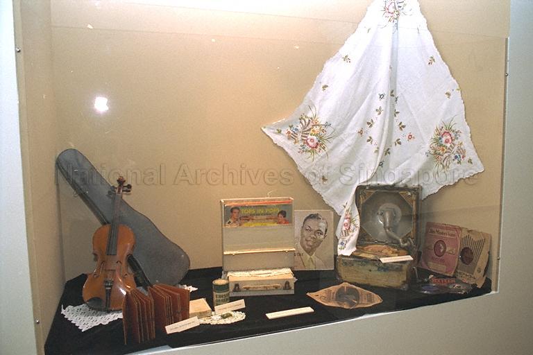 An old musical instrument and artefacts displayed at the