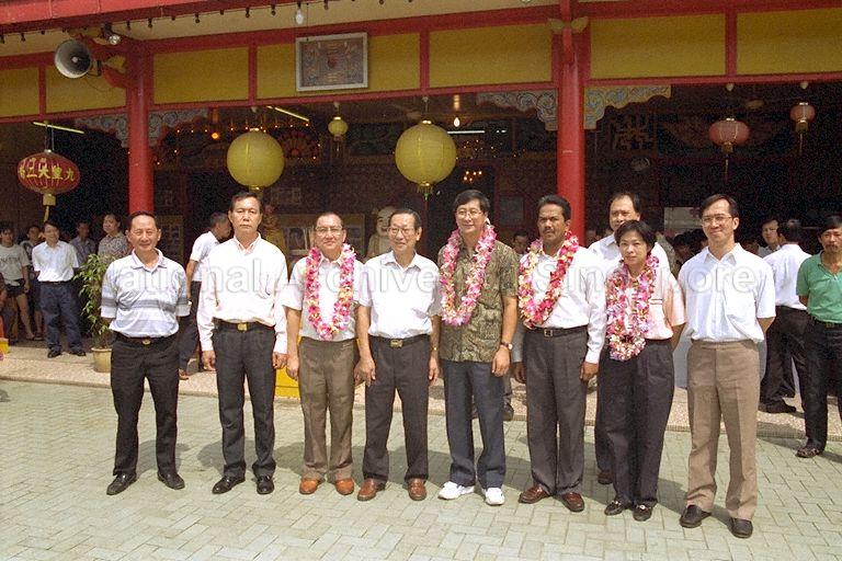 Group photograph taken at Leong Nam temple at Geylang Serai with Minister without Portfolio Lim Boon Heng (fifth from left), Member of Parliament (MP) for Aljunied Group Representation Constituency (GRC) Chin Harn Tong (third from left), Parliamentary Secretary to Ministry of Information and the Arts Mohamad Maidin Bin Packer Mohd (sixth from left), second adviser to grassroots organisation in Aljunied GRC Mrs Lim Hwee Hua (second from right) and second adviser to Nee Soon South Dr Tan Boon Wan (right) during community visit to Aljunied GRC, 