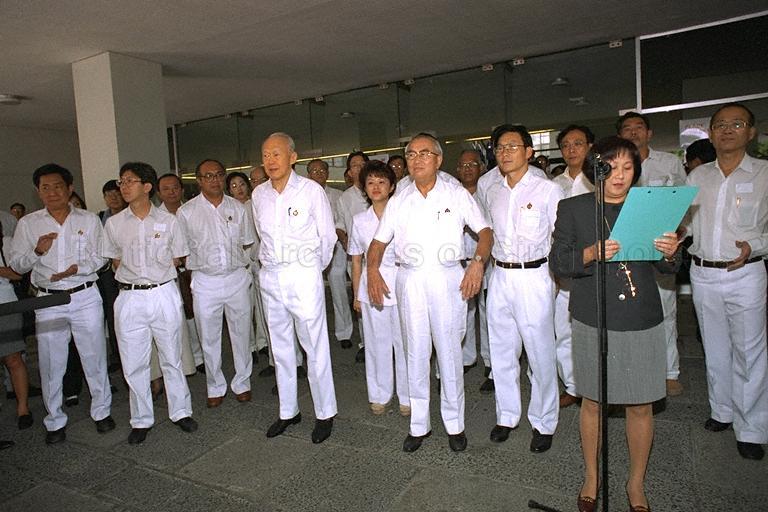 Official announcing nomination day results at Singapore Conference Hall, the nomination centre for Kreta Ayer-Tanglin/Tanjong Pagar Group Representation Constituencies. Standing from left are, People's Action Party (PAP) candidates Chay Wai Chuen, Koo Tsai Kee, Dr S Vasoo, Lee Kuan Yew, Dr Lily Neo, Dr Richard Hu Tsu Tau and Lew Syn Pau.