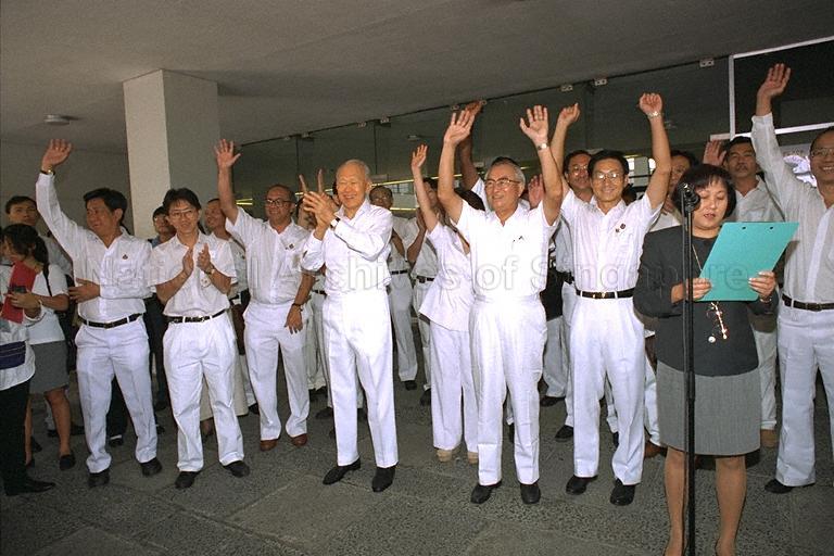Official announcing nomination day results at Singapore Conference Hall, the nomination centre for Kreta Ayer-Tanglin/Tanjong Pagar Group Representation Constituencies. Standing from left are, People's Action Party (PAP) candidates Chay Wai Chuen, Koo Tsai Kee, Dr S Vasoo, Lee Kuan Yew, Dr Lily Neo (hidden), Dr Richard Hu Tsu Tau and Lew Syn Pau.