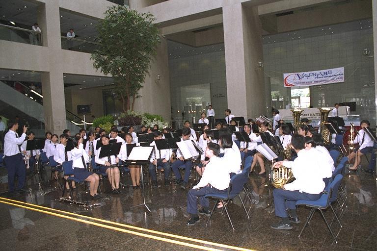 Saint Andrew's Junior College (SAJC) Concert Band giving lunchtime performance at Port of Singapore Authority (PSA) Building