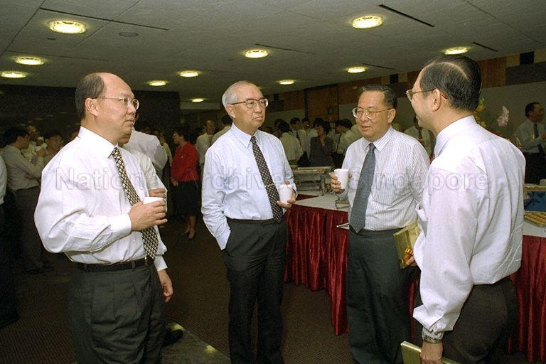 (From right) Permanent Secretary (PS) to Ministry of Education Lim Siong Guan (back to camera), PS to Ministry of Finance Ngiam Tong Dow, Minister for Finance Dr Richard Hu Tsu Tau and PS (Development) to Ministry of Foreign Affairs Tan Chin Tiong at the reception during Autonomous Agencies Commissioning Ceremony held at the auditorium of Treasury Building, High Street
