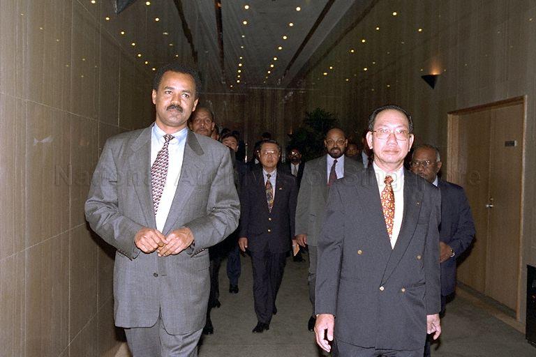 President Isaias Afwerki of Eritrea arriving at Port of Singapore Authority (PSA) Building for a visit. Among those with him are PSA President of International Business Division Goon Kok Loon (right) and Ministry of Foreign Affairs' Chief of Protocol Tan Keng Jin (centre).
