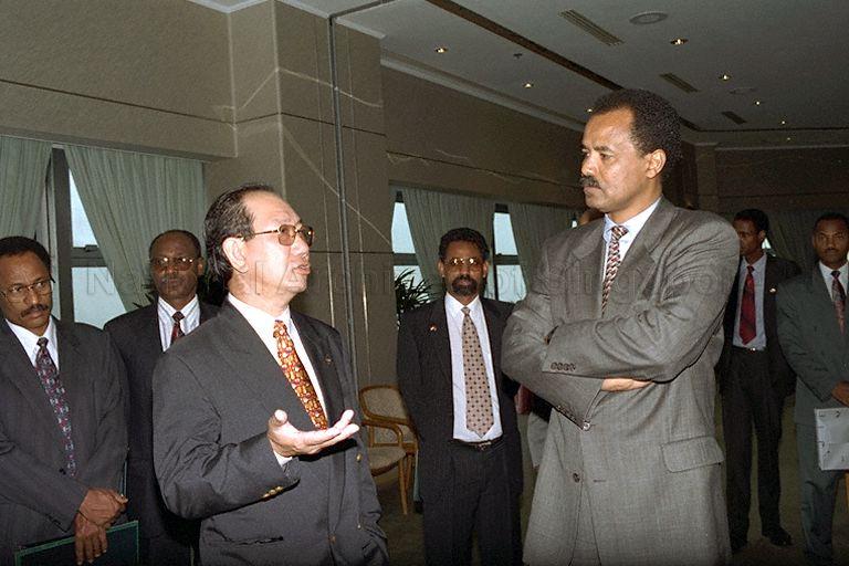 President Isaias Afwerki of Eritrea and delegation members with President of International Business Division Goon Kok Loon at Port of Singapore Authority (PSA) Building during visit to PSA followed by land tour of port facilities