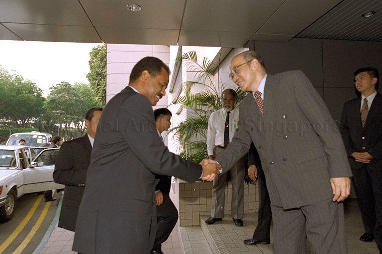 Eritrean President Isaias Afwerki being greeted by Minister of State for Foreign Affairs Dr Ow Chin Hock on arrival at VIP Complex, Terminal 1, Changi Airport, for his flight home at the end of a four-day visit to Singapore