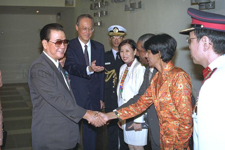 Chinese Premier Li Peng and his wife, Madam Zhu Lin (hidden), being introduced to Minister for Foreign Affairs and Law Professor S Jayakumar and his wife by Prime Minister Goh Chok Tong when they arrive at Singapore Changi Airport Terminal 2, VIP Complex, for a three-day official visit to Singapore. Also present is Mrs Goh Chok Tong.