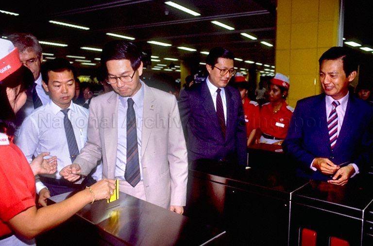 Second Deputy Prime Minister Ong Teng Cheong inserting his train ticket to enter the train station while Minister for Communications and Information and Second Minister for Defence (Policy) Dr Yeo Ning Hong (right) looks on during official opening of the Yio Chu Kang-Toa Payoh line of the Mass Rapid Transit system