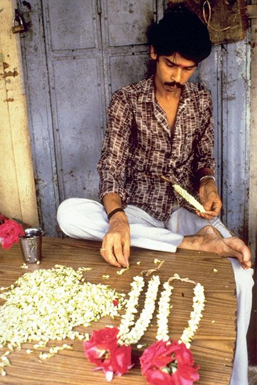 Making of Indian flower garlands