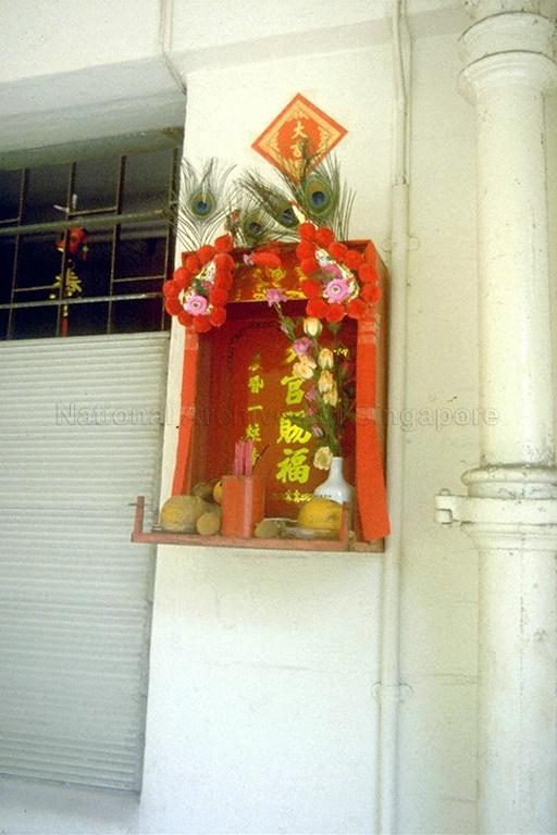 A Taoist prayer altar outside a Housing and Development Board (HDB) flat