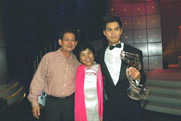Fame Awards winner Pierre Png (right) with his parents after award presentation ceremony at Television Corporation of Singapore (TCS) TV Theatre