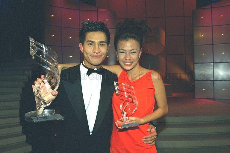 Fame Awards winner Pierre Png with second prize winner Eliza Lin posing for a photograph with their trophies after award presentation ceremony at Television Corporation of Singapore (TCS) TV Theatre