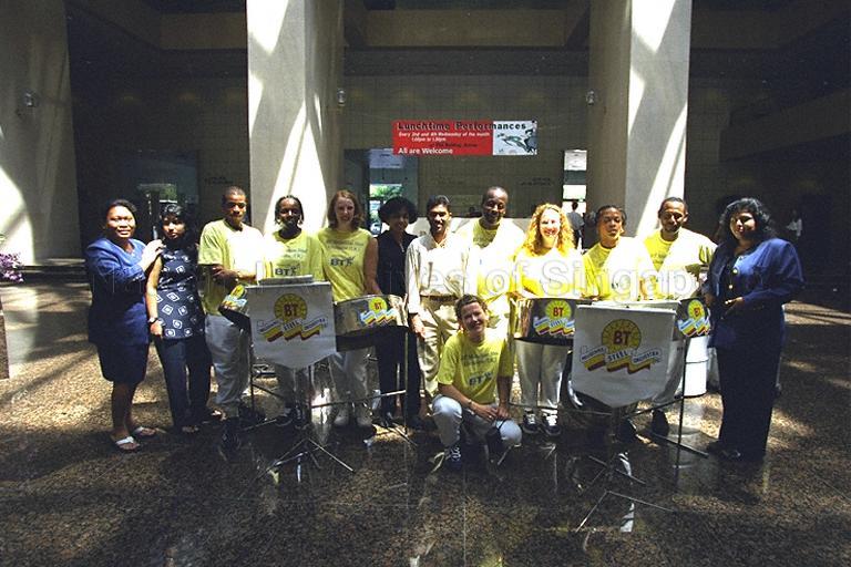 Lunchtime performance by BT Melodians Steel Orchestra from the United Kingdom at PSA Building. The group came to Singapore as part of the Singapore Festival of Arts Fringe 1998.