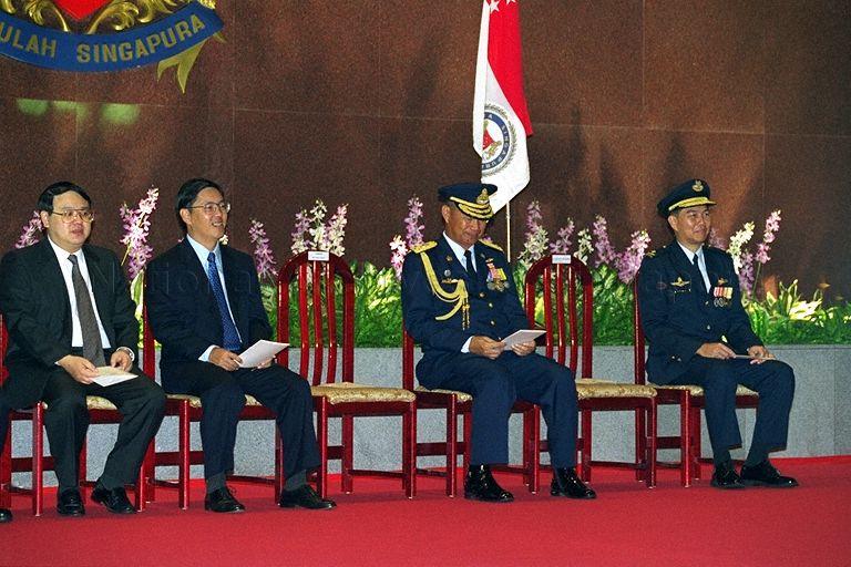 Permanent Secretary (Defence Development) Peter Ho Hak Ean (first from left), Minister of State, Ministry of Defence Matthias Yao Chih (second from left) and Chief of Air Force, Brigadier-General Raymund Ng (fourth from left) at Conferment Ceremony of the Pingat Jasa Gemilang (Tentera) [Meritorious Service Medal (Military)] by Acting Minister for Defence and Minister for Education Rear Admiral Teo Chee Hean on Commander-in-Chief of the Royal Thai Air Force (RTAF), Air Chief Marshal (ACM) Tananit Niamtan (third from left) at Ministry of Defence. ACM Tananit, who assumed his appointment in October 1997, was conferred the award for his efforts and contributions in strengthening the ties of cooperation and friendship between the RTAF and the Republic of Singapore Air Force (RSAF).