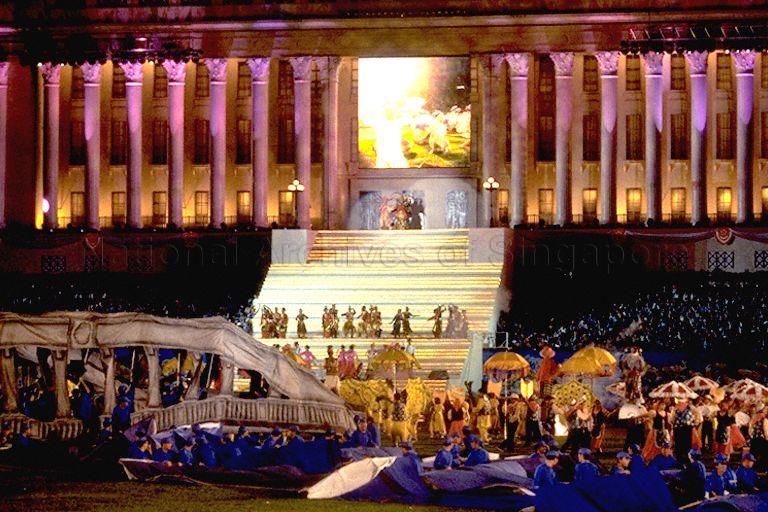 National Day Parade 1998 at National Stadium -- View of first of four-part mass display performance "River of Life", featuring multi-ethnic cast of 1200 enacting the nation's rise from humble banks of Singapore River