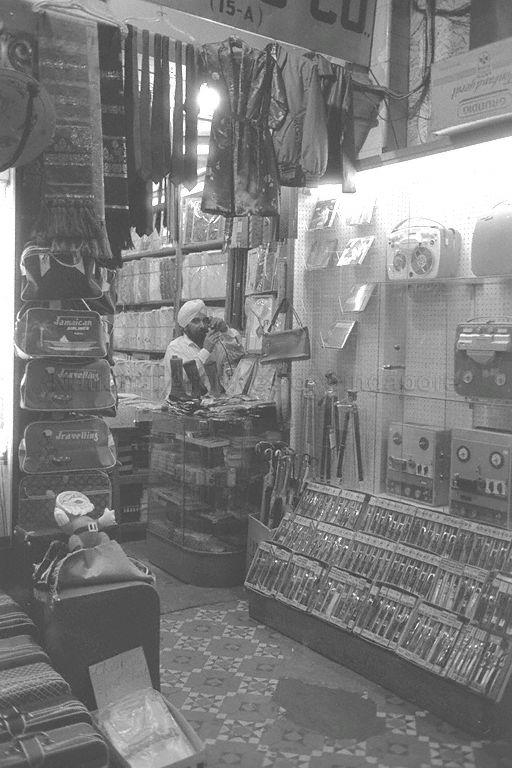 The Arcade or the Alkaff Arcade was built in 1909 and was Singapore's first indoor shopping centre stretching from Collyer Quay to Raffles Place. The building was designed by David McLeod Craik.