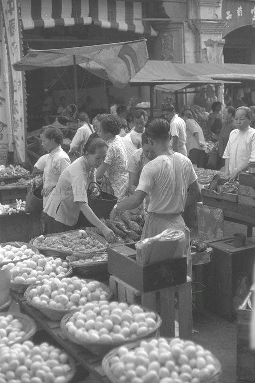 Market along Sago Street in Chinatown selling groceries and daily necessities